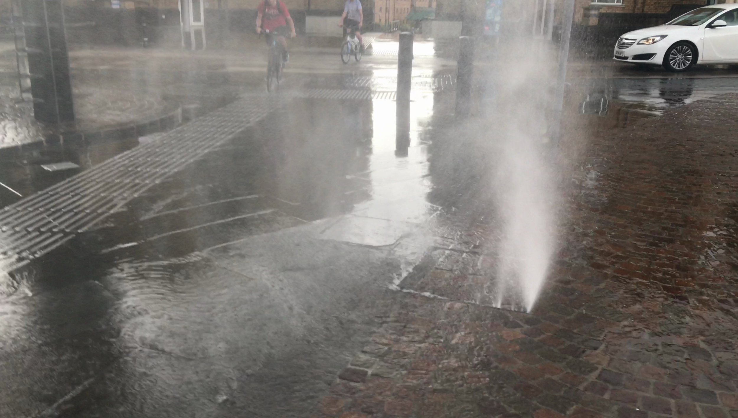 Woman, Child Narrowly Avoid Injury In Manhole Explosion Woman, Child Narrowly Avoid Injury In Manhole Explosion